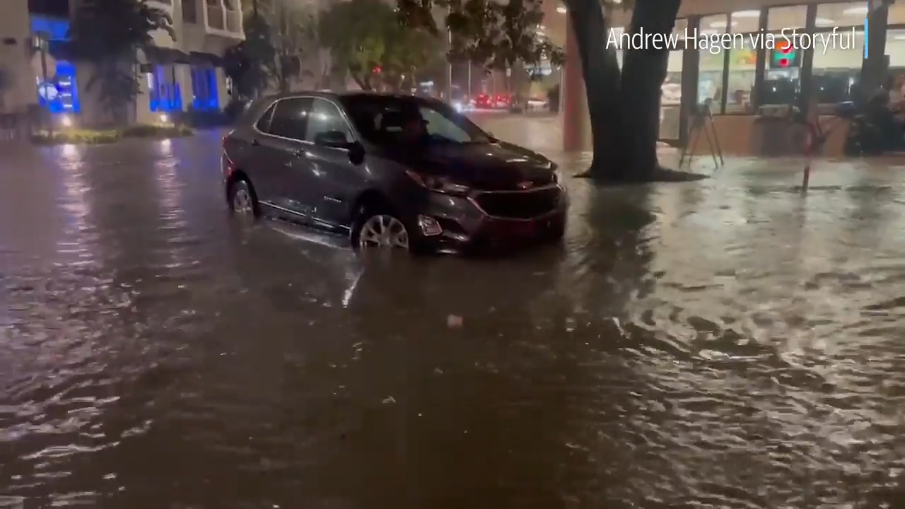 Watch as flash floods overtake downtown Miami, Florida | Miami Herald