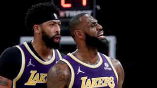 LOS ANGELES, CALIF. - OCT. 29, 2021. Lakers forward Anthony Davis talks with teammate LeBron James.