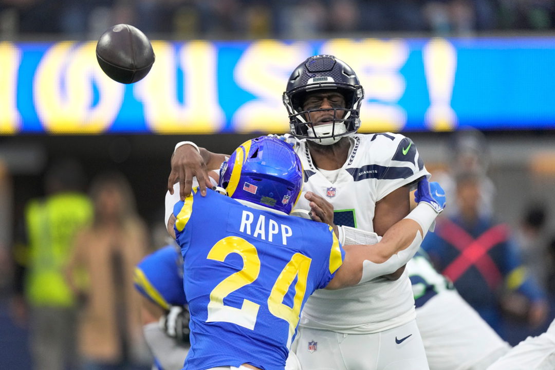 Seattle Seahawks running back Travis Homer (25) runs onto the field during  an NFL football game against the San Francisco 49ers, Sunday, Sept. 18,  2022, in Santa Clara, Calif. (AP Photo/Scot Tucker