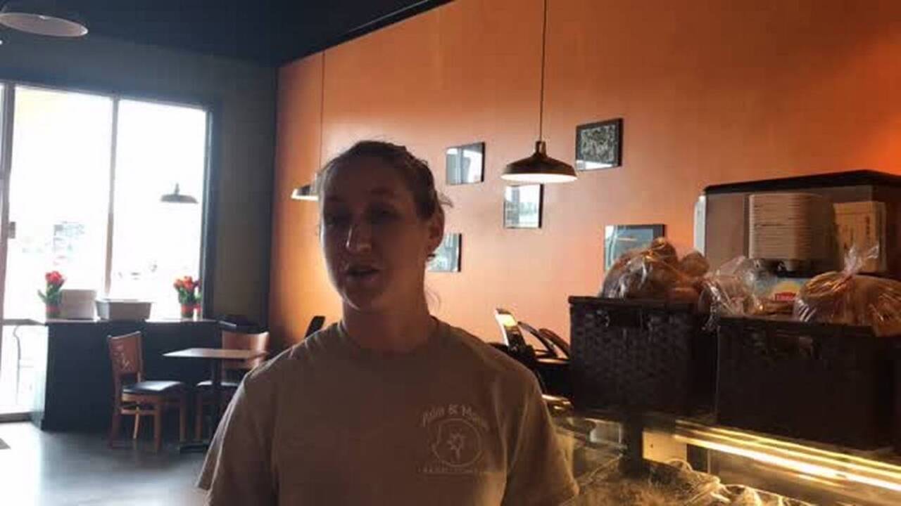 How does Palm and Moon Bagel Cafe know their sign was stolen? Hilton