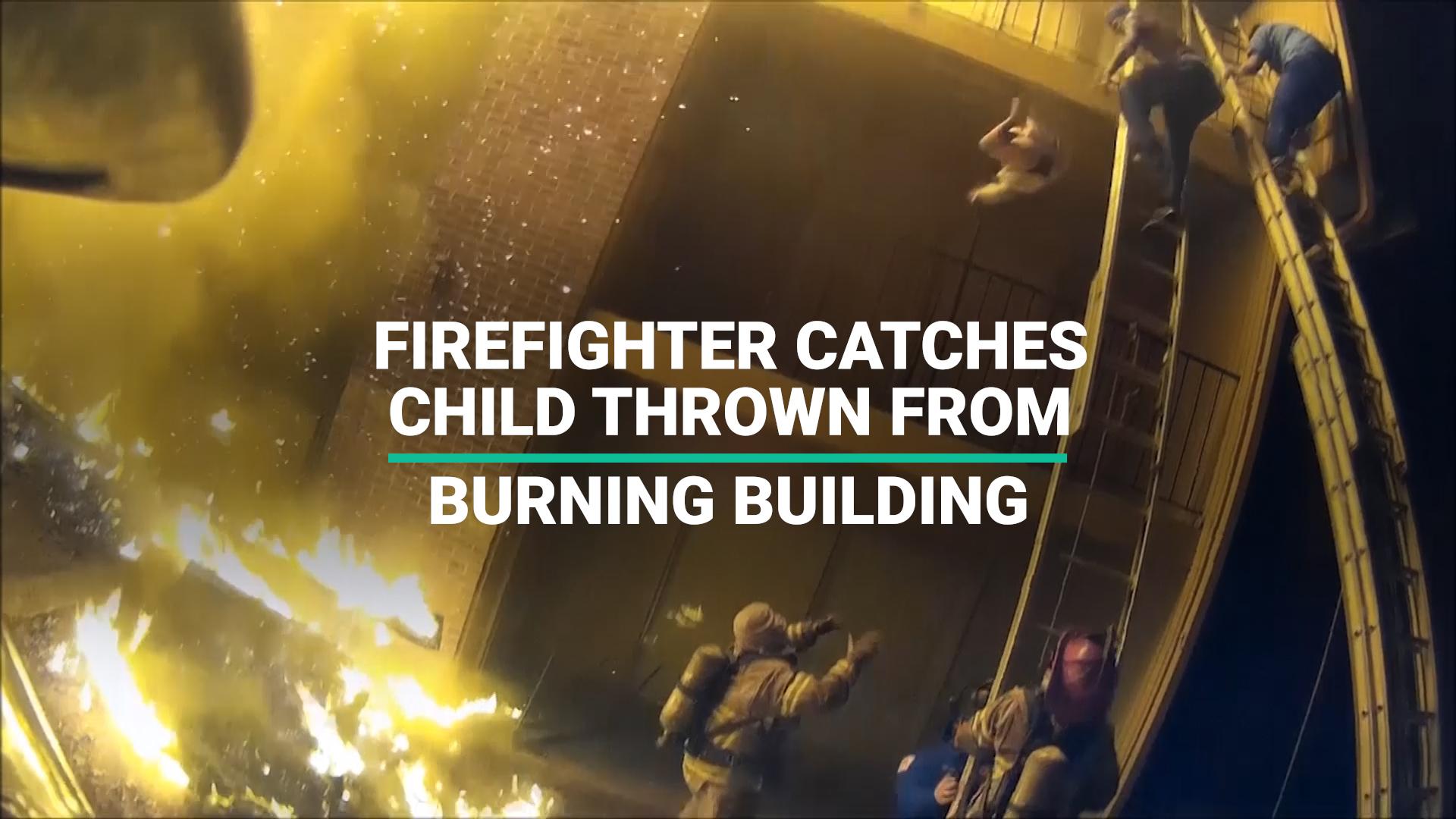 Firefighter Catches Child Thrown From Burning Building | HuffPost UK News