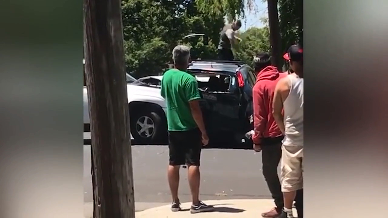 Watch the extreme road rage, car-ramming crash at 10th and X in ...