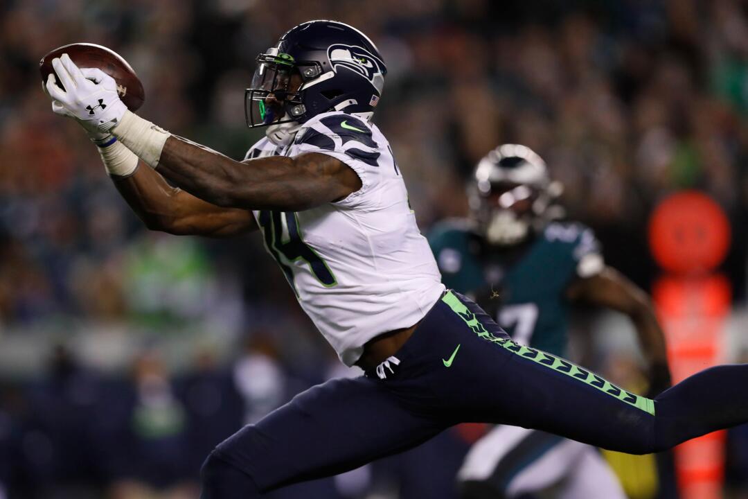 Metcalf's playoff explosion lends to Seattle Seahawks Wild Card win