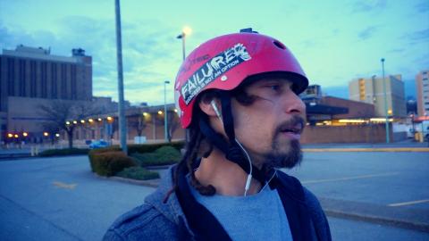 BMX Pete Rides a curb