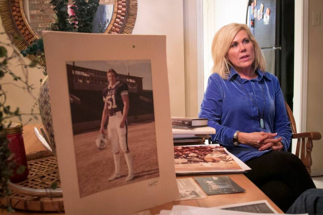 Haunted by husband's death, widow takes CTE fight to Super Bowl