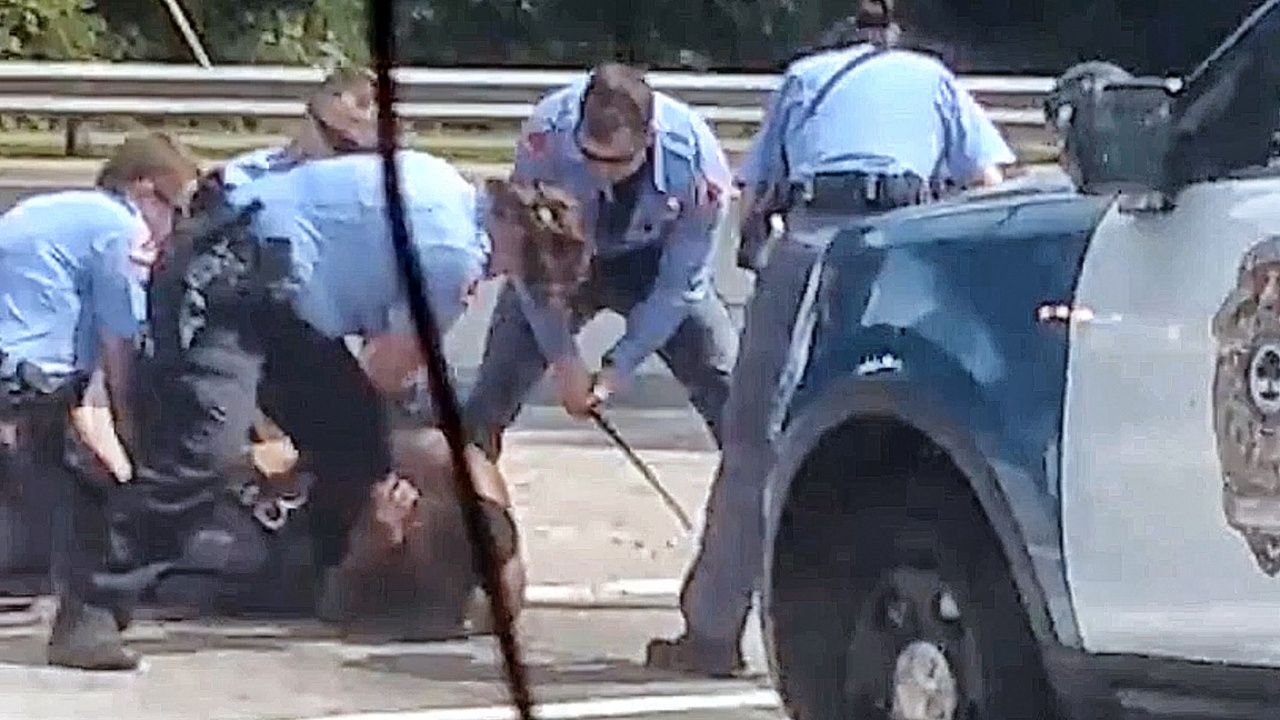 Raleigh police officers restrain, strike man in street | Raleigh News ...