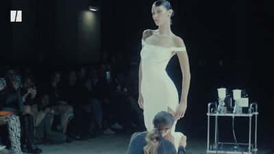 Bella Hadid Stuns As Dress Is Sprayed Onto Her Body At Paris Fashion Week