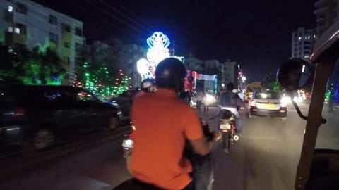 A Busy Street At Night In Bengaluru