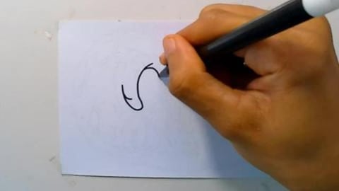 Drawing cartoon graffiti of zombie head lying