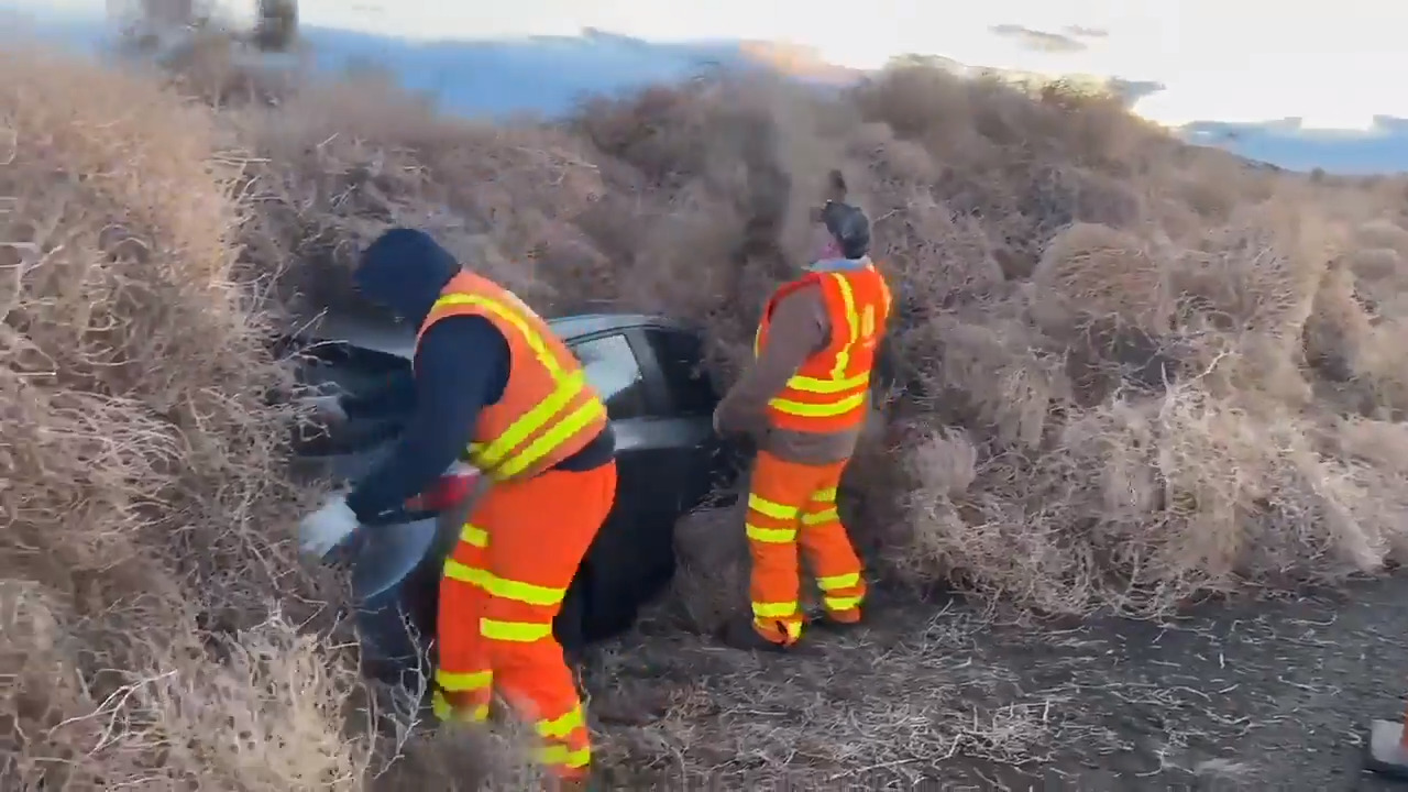 30-foot tumbleweed pileup traps cars, semi-truck on Washington highway