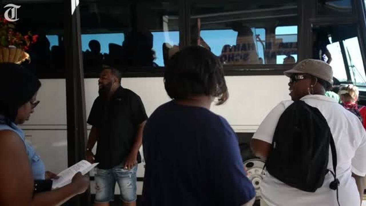 Hartley Elementary School teachers and staff tour neighborhood, visit