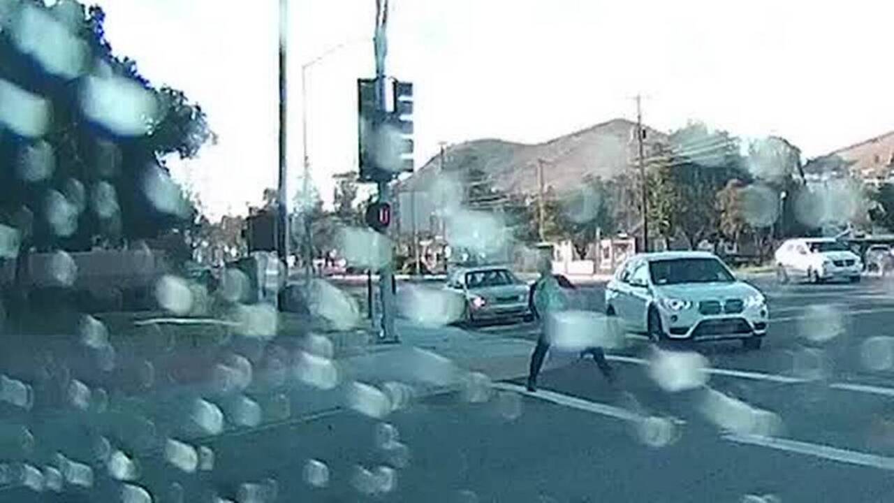 Who's at fault? Pedestrian kicks car at SLO intersection San Luis