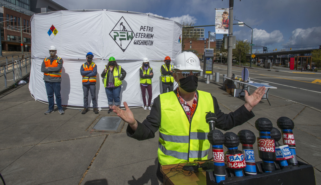 Mock press conference pokes fun at Port of reliance on fossil