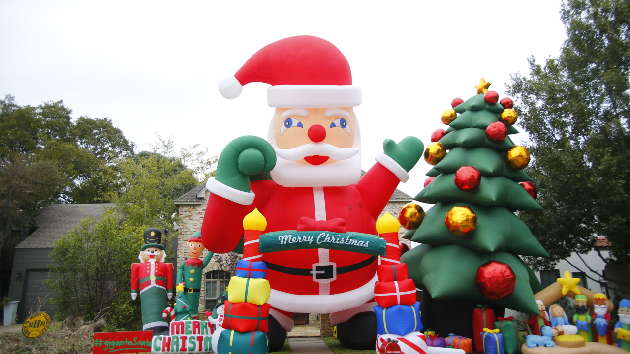 Fort Worth family uses 40foottall inflatable Santa Claus to spread