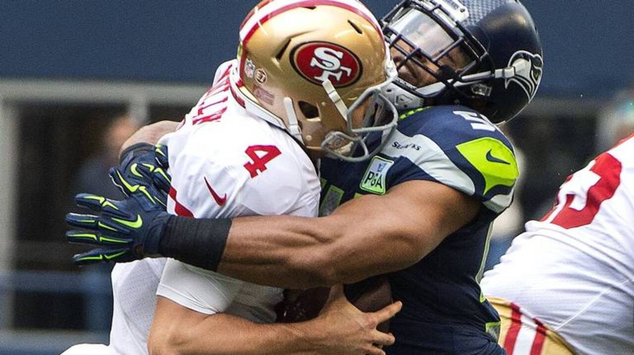 September 17, 2017: Seattle Seahawks linebacker Bobby Wagner (54) runs with  the ball after an interception during a game between the San Francisco  49ers and the Seattle Seahawks at CenturyLink Field in