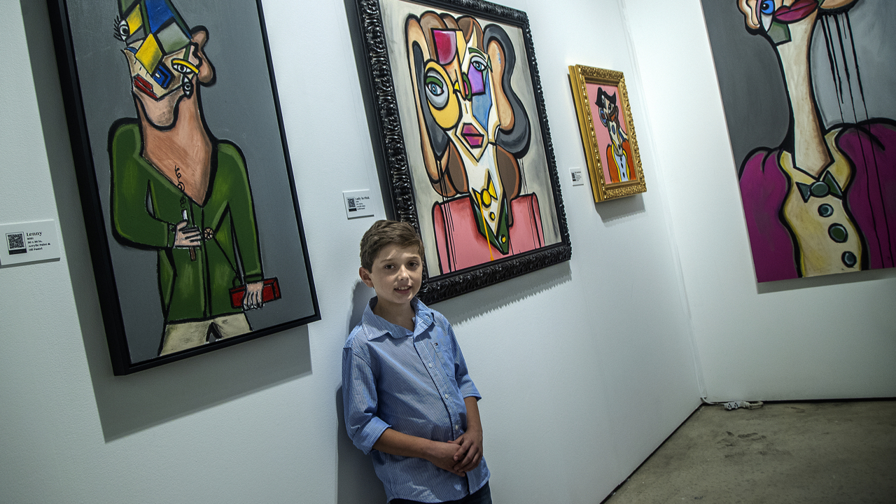 10-year-old artist Andres Valencia sells out gallery at Miami Art