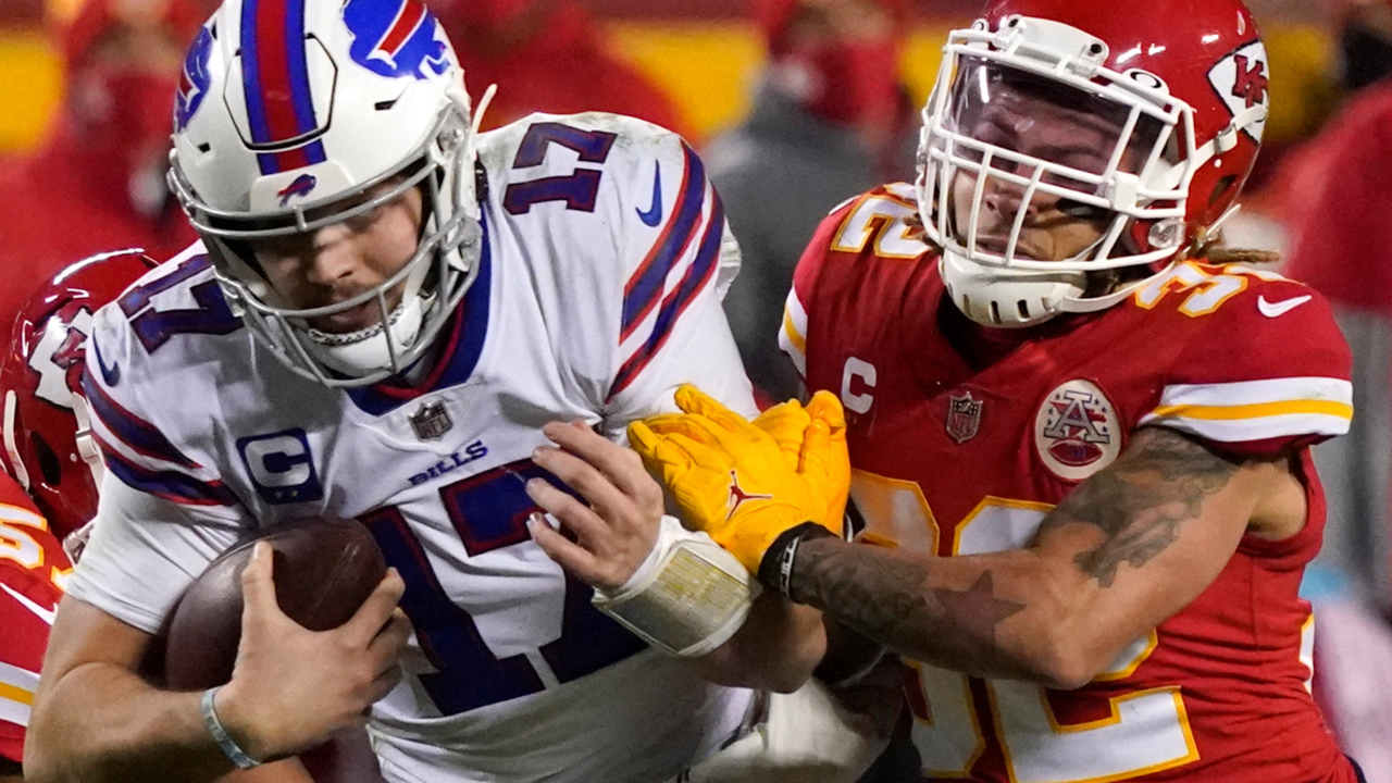 Buffalo Bills wide receiver Stefon Diggs is tackled by Kansas City Chiefs  safety Tyrann Mathieu …