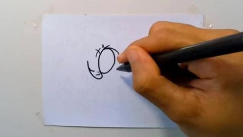 Drawing cartoon graffiti of zombie head lying shorts