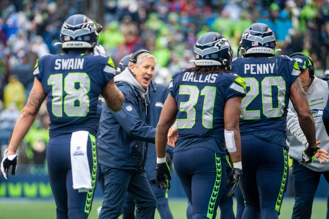 Seattle Seahawks offensive tackle Jake Curhan (74) walks back to the locker  room after an NFL