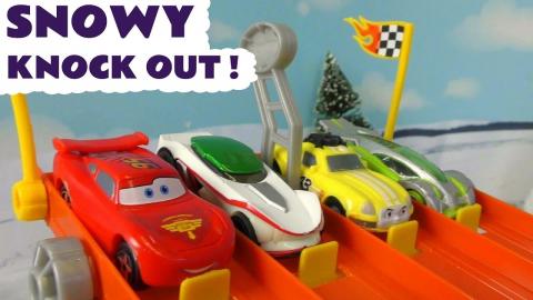 Disney Cars Hot Wheels Snowy Knock Out Race with Toy Stor...
