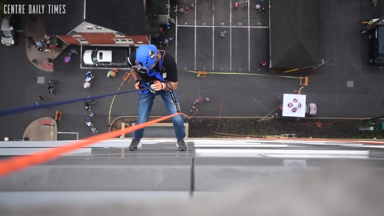 Over the Edge State College raises money for the Interfaith Human