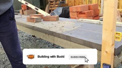 Beginner bricklaying to a line