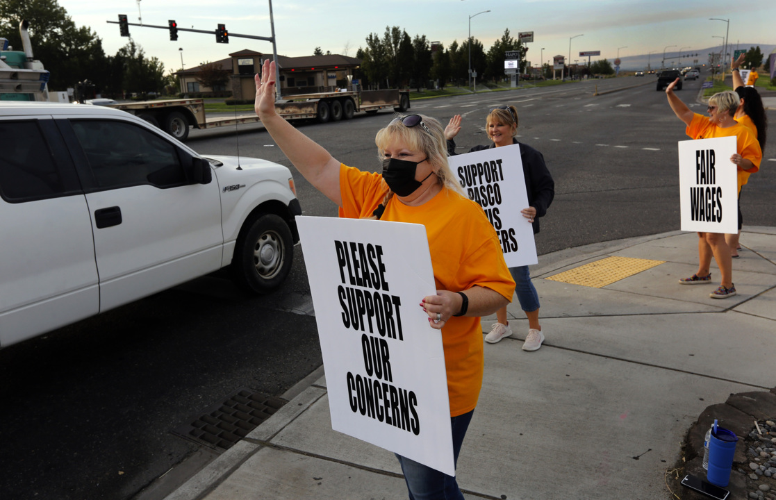Pasco school bus drivers hold an informational picket seeking support