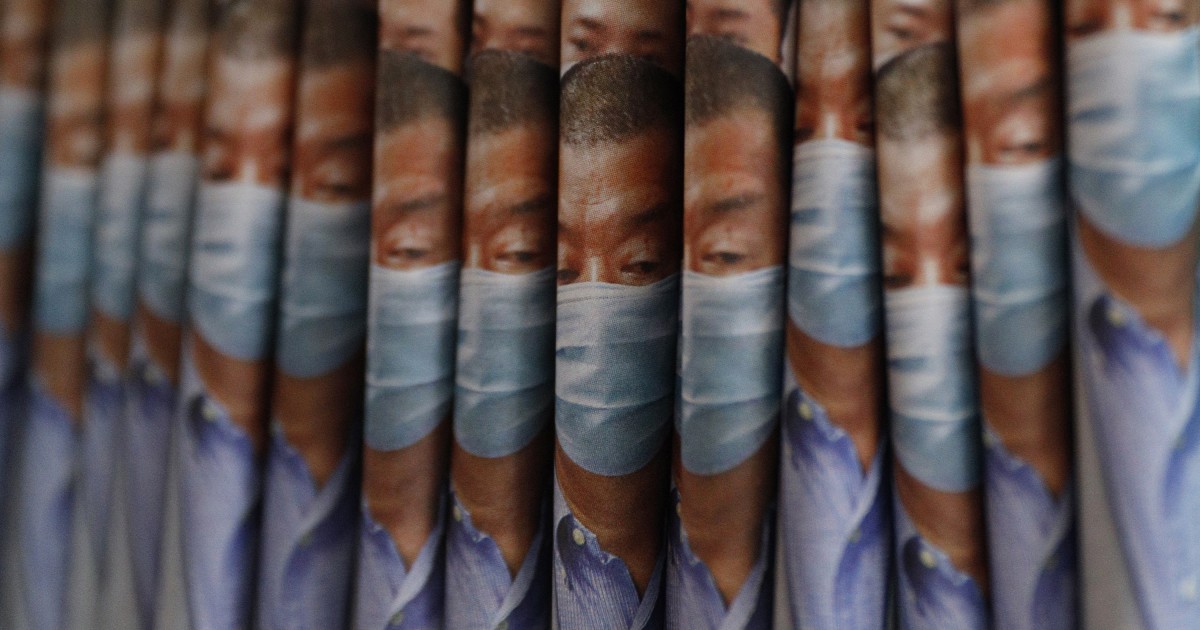 Copies of Apple Daily newspaper with front pages featuring Hong Kong media tycoon Jimmy Lai, are displayed for sale at a newsstand in Hong Kong, Tuesday, Aug. 11, 2020. Hong Kong police have arrest...