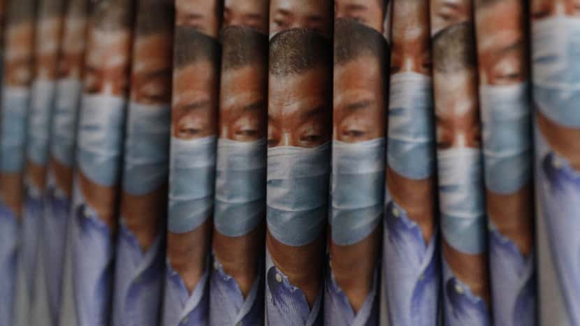 Copies of Apple Daily newspaper with front pages featuring Hong Kong media tycoon Jimmy Lai, are displayed for sale at a newsstand in Hong Kong, Tuesday, Aug. 11, 2020. Hong Kong police have arrest...