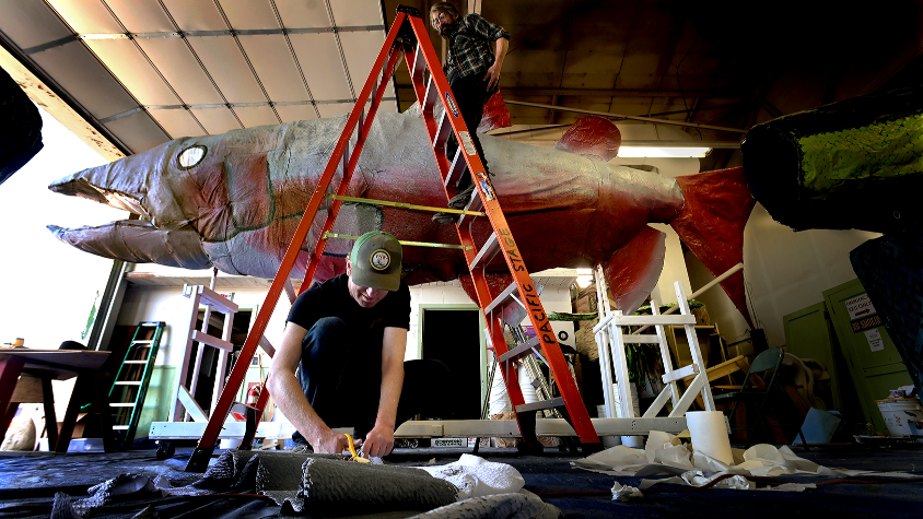 Procession newbies dive in with 20 foot Salmon likeness for Saturday’s parade