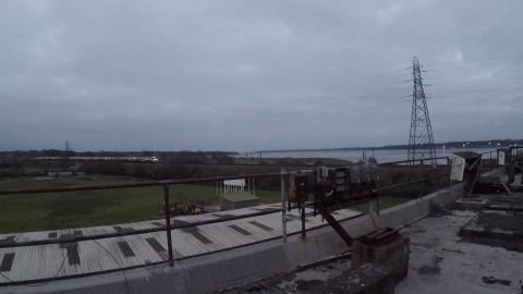 CALM ABANDONED ROOF WATCHING TRAIN GO BY...