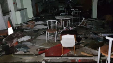 INSIDE ABANDONED DINER AT NIGHT...