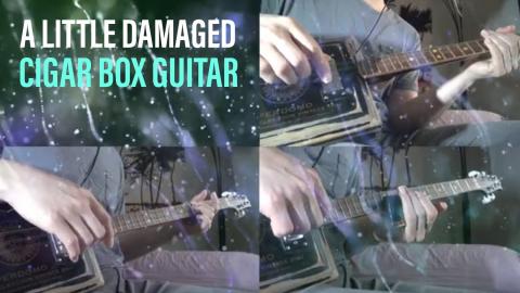 A Little Damaged - Cigar Box Guitar