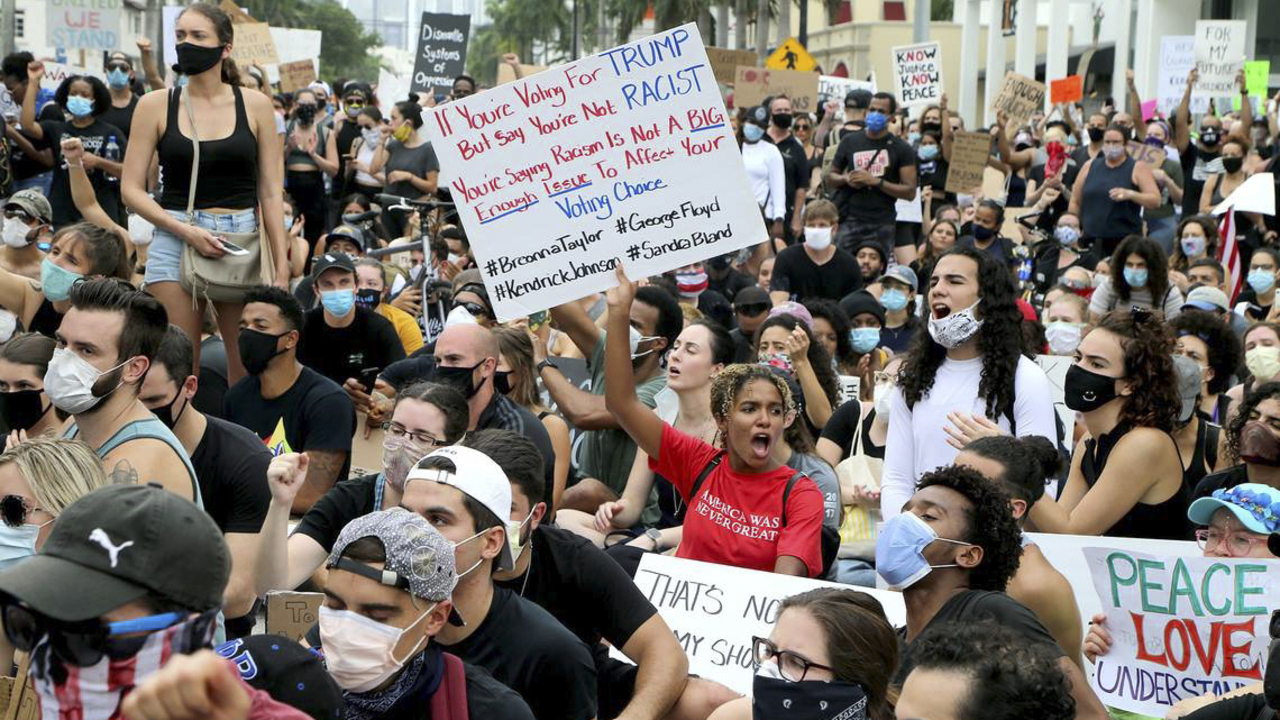 Protesters fill the streets of downtown Miami | Miami Herald