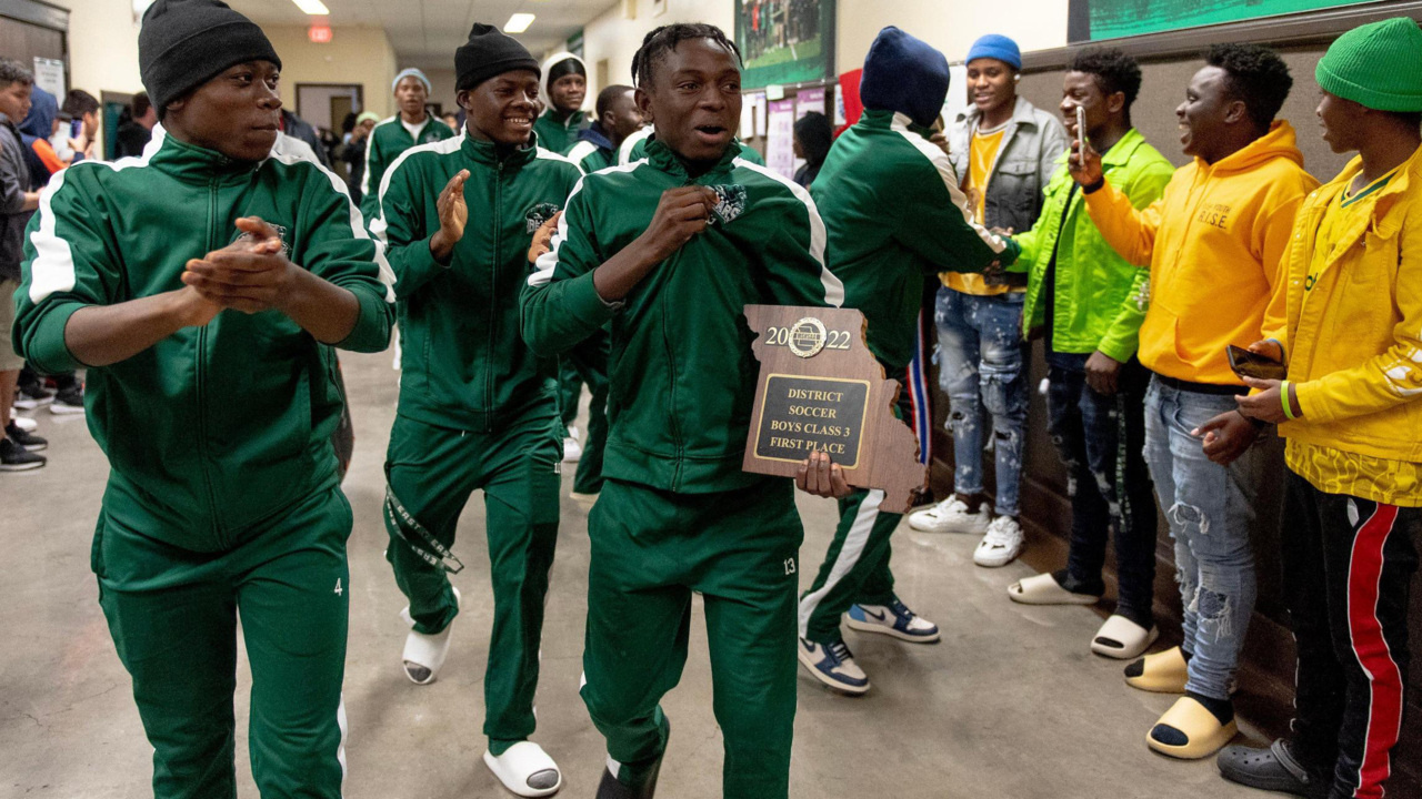 Kansas City East High School soccer team made up of players from many