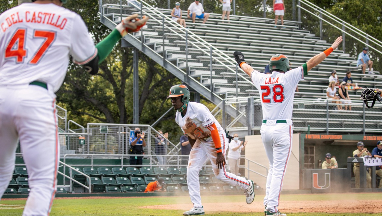 Miami Hurricanes head coach Gino DiMare gives instructions to his team  during the third inning of a NCAA baseball game against the Florida  Atlantic University Owls at Alex Rodriguez Park at Mark