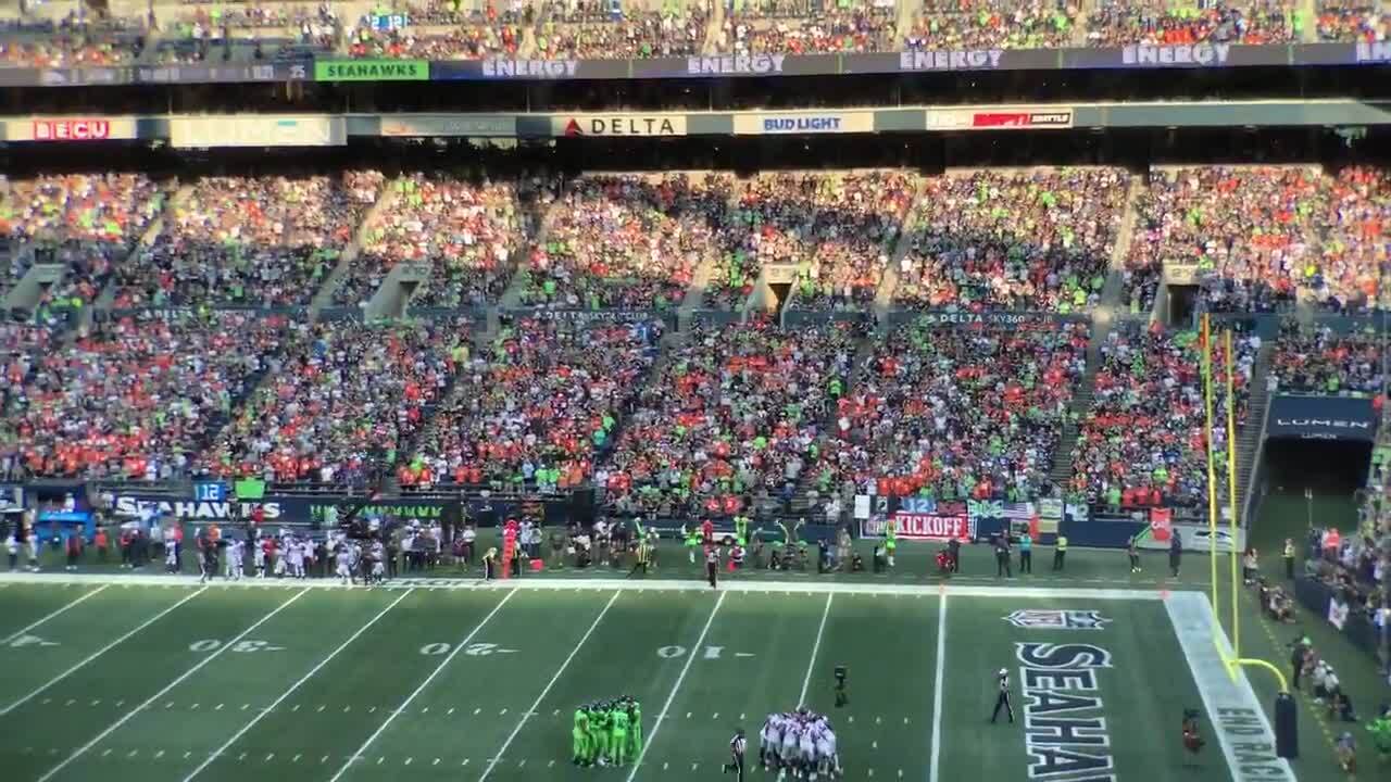 Broncos Russell Wilson greets some Seahawks, 1st fans in boo