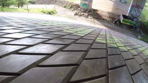 POV SLIDING DOWN ABANDONED UNDERPASS