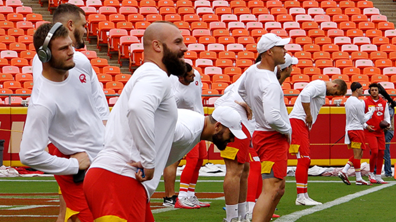 Kansas City Chiefs players, indulging running back Damien Williams (26) and  quarterback Patrick Mahomes (15) stand for the national anthem before an NFL  football game against the Tennessee Titans Sunday, Nov. 10