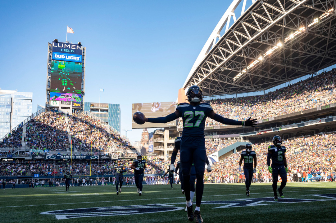 NFC cornerback Tariq Woolen (27) of the Seattle Seahawks tosses a