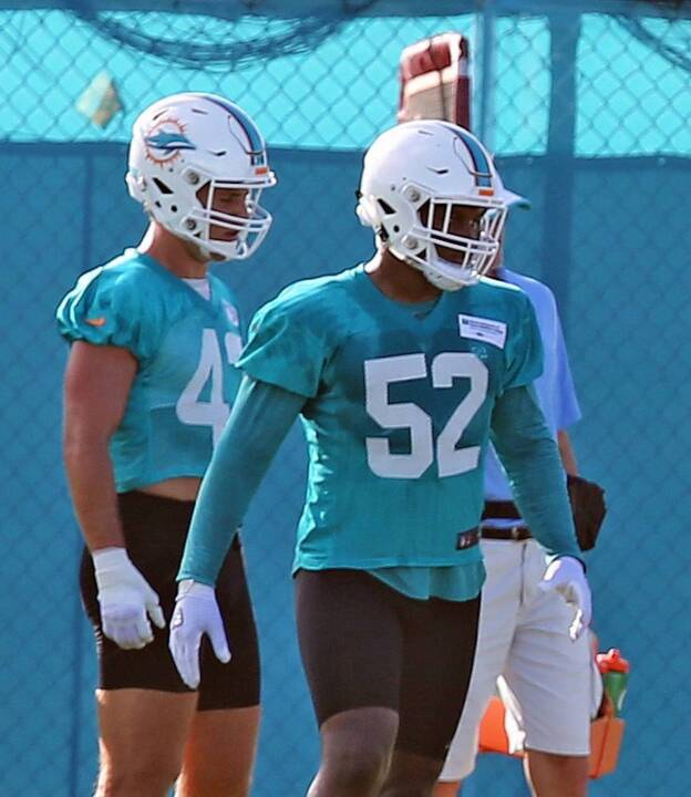 Miami Dolphins linebacker Raekwon McMillan (52) walks the