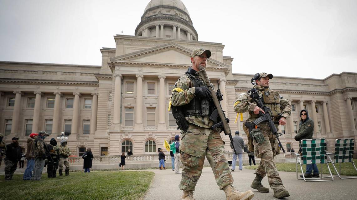 Armed protesters gather outside KY Capitol, rail against McConnell, Paul and Beshear