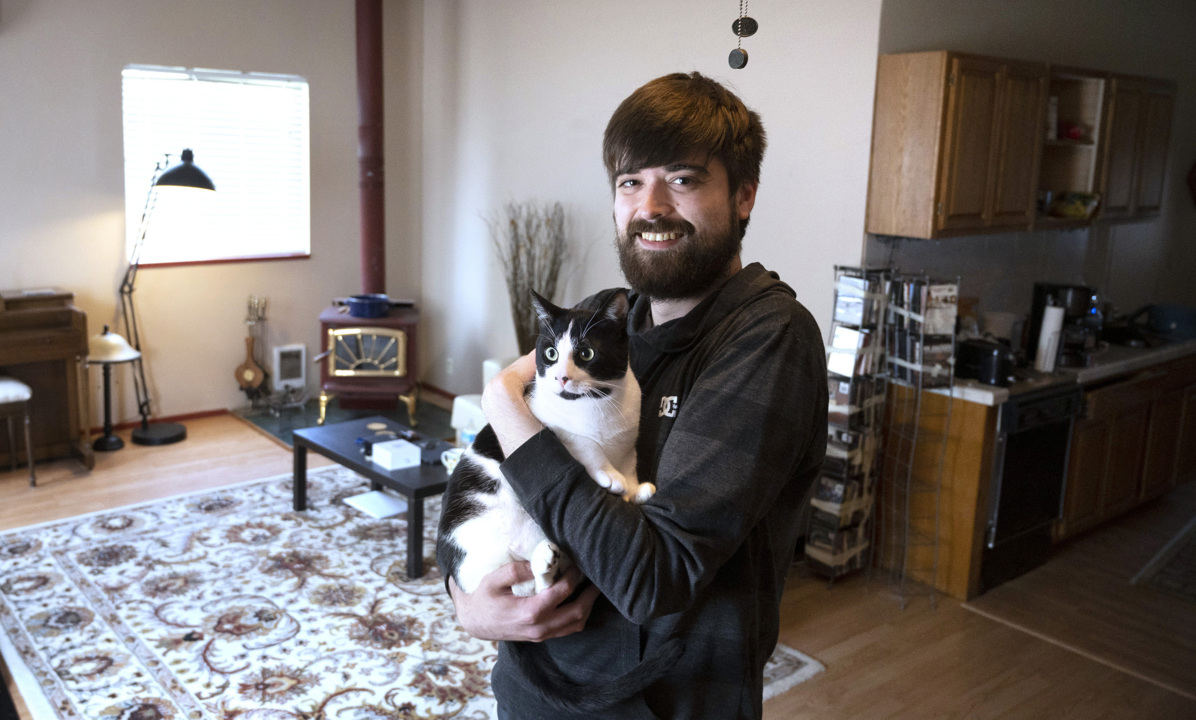 Ashton Burcher and his husband lived in motels for nine months before