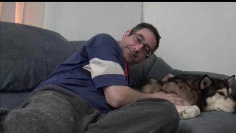 Malamute cuddle-time and Husky must have attention