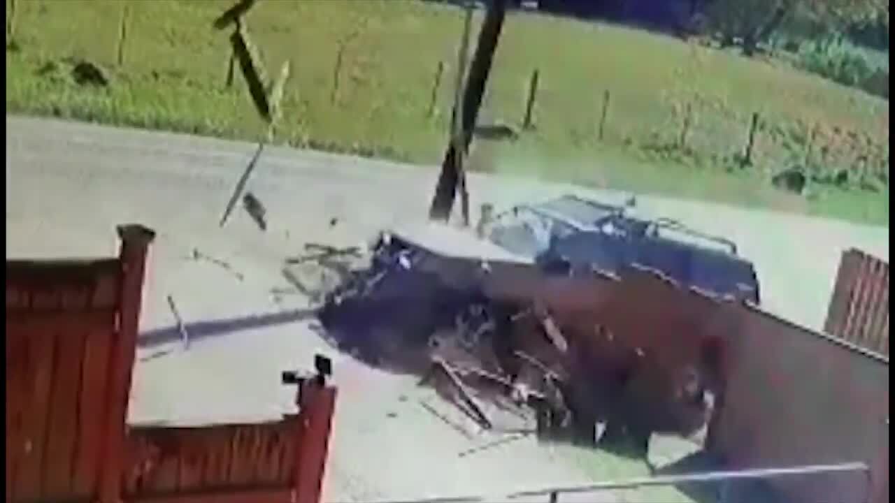 Distracted driver crashed straight into power pole, sending it flying