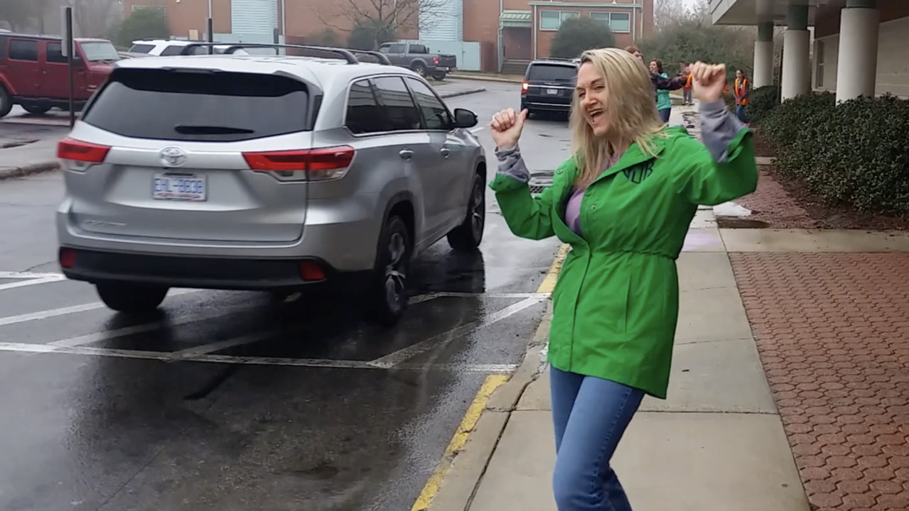 Wake County schools Dancing teachers greet students in carpool lane