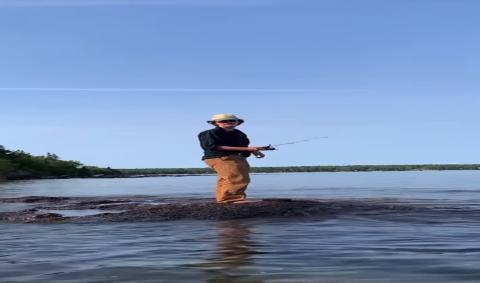 Fishing from the shore on Lake Superior Canada
