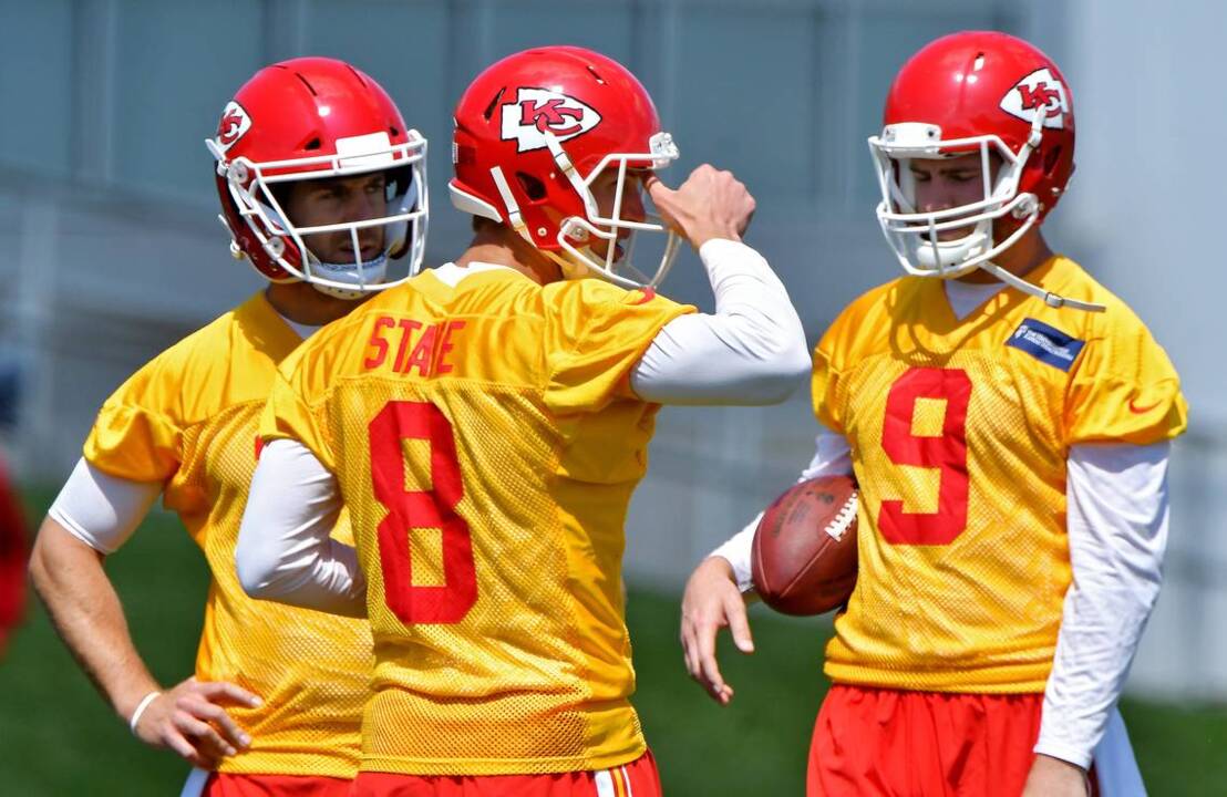 Kansas City Chiefs quarterbacks Tyler Bray, Alex Smith and Patrick Mahomes  walked togethe…