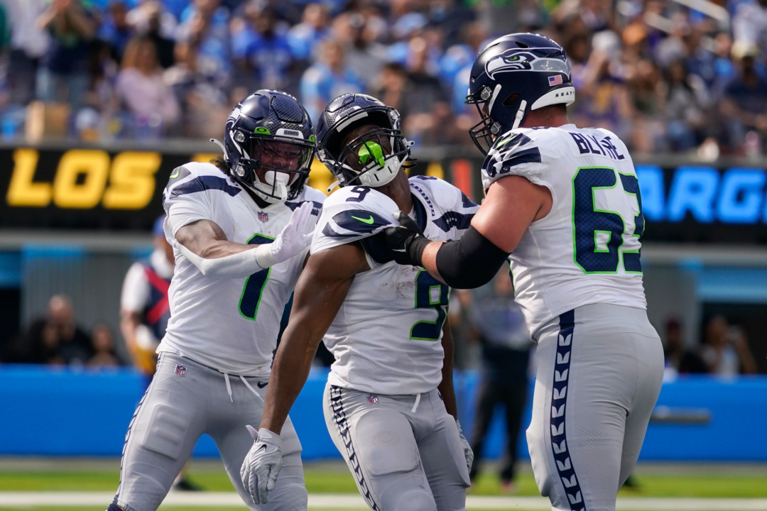 Seattle Seahawks running back Kenneth Walker III (9) runs the ball during  an NFL football game against the Tampa Bay Buccaneers on Nov. 13, 2022, in  Munich. The Buccaneers defeated the Seahawks