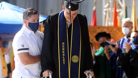 Paralyzed Cal rugby player Robert Paylor keeps promise, walks across stage for college diploma